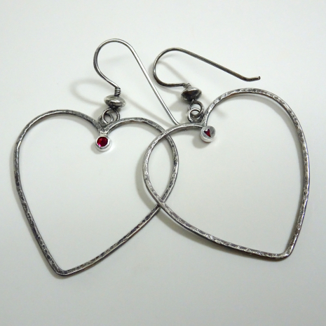 Reverse of Forged Heart Earrings showing tiny pierced hearts